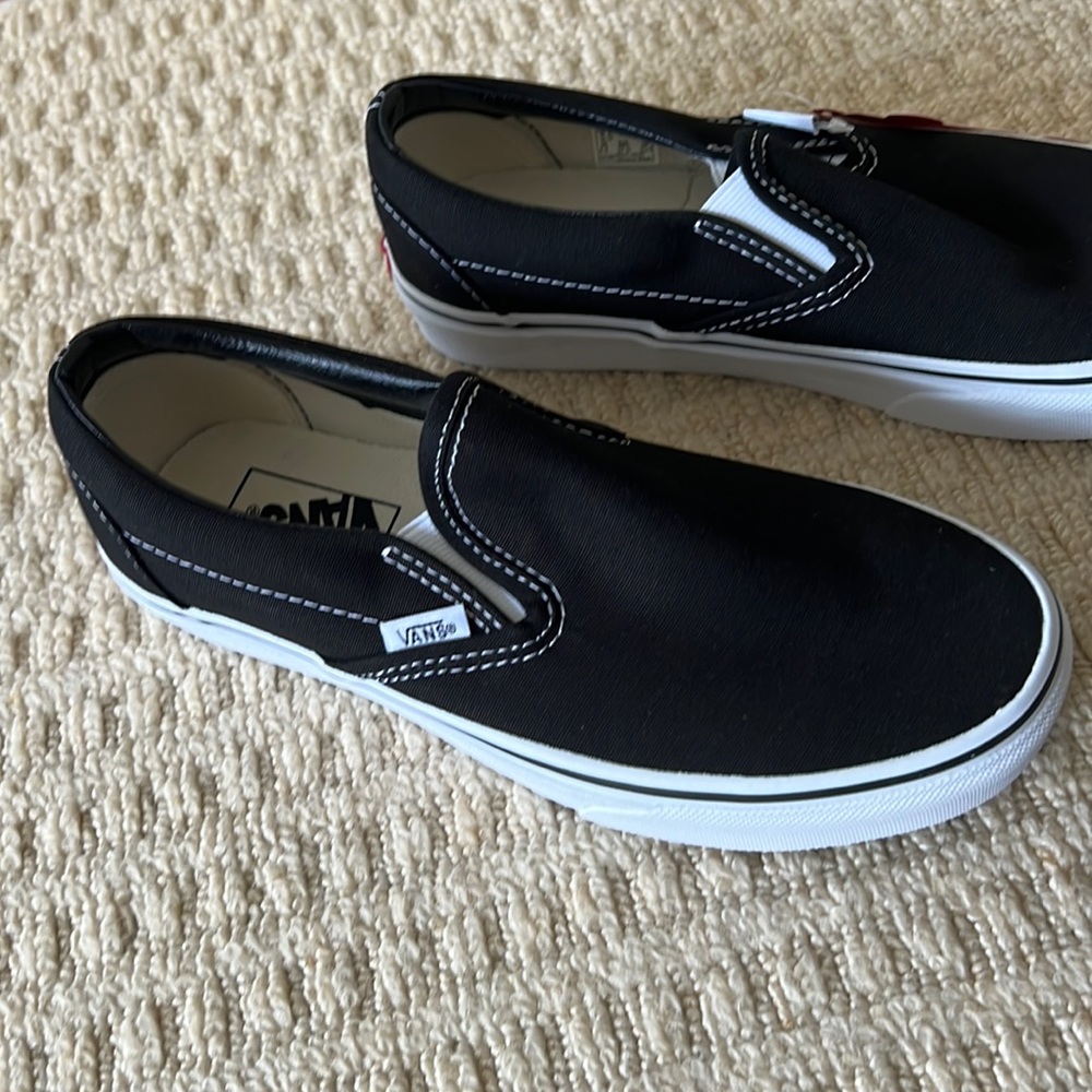 Brand new Vans womens slip on sneakers never worn too small for me ..